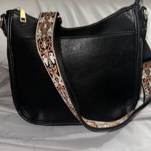 NWOT Amazon black Faux leather crossbody bag with guitar strap nice size love 💕